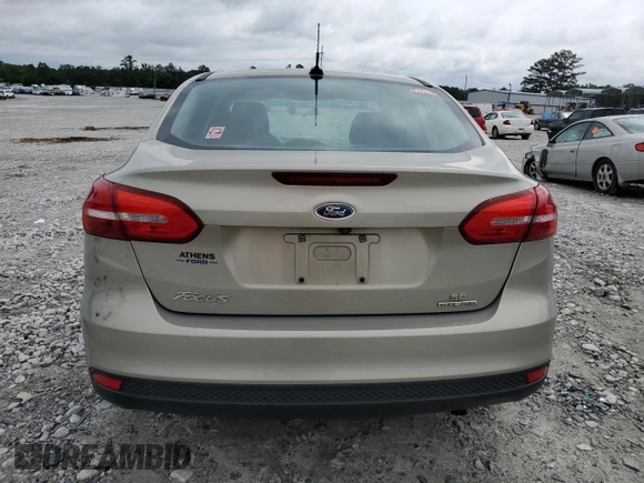2016 Ford Focus SE z VIN 1FADP3F2XGL341167, wystawiony jako Copart lot #59042435 z przebiegiem 71 345 mil mil oraz Szkoda całkowita • Salvage title. Historia ofert i sprzedaży dostępna na DreamBid. Obrazek 6.