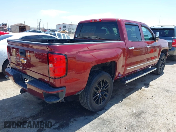 2017 Chevrolet Silverado 1500 LT with VIN 3GCUKREC4HG164281, listed as a IAAI auction lot 42037712 with 133,935 mi miles and . Bid and sale history available at DreamBid. Image 4.