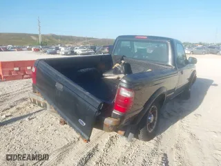 2003 Ford Ranger XL with VIN 1FTYR10U23PA44921, listed as a IAAI auction lot 41788023 with 128,034 mi miles. Bid and sale history available at carsss.com. Image 4.