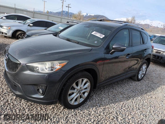 2015 Mazda CX-5 Grand Touring with VIN JM3KE4DY3F0495411, listed as a Copart auction lot 50077765 with 136,191 mi miles and Salvage Title. Bid and sale history available at DreamBid. Image 1.