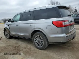 2020 Lincoln Navigator with VIN 5LMJJ2NT0LEL09760, listed as a Copart auction lot 86628254 with 118,733 mi miles and Salvage title. Bid and sale history available at DreamBid. Image 2.