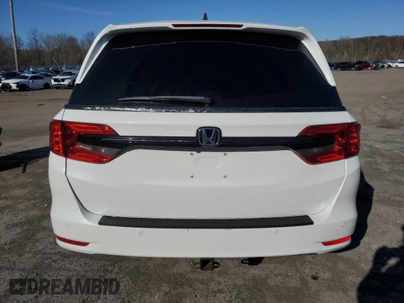 2021 Honda Odyssey EX-L with VIN 5FNRL6H78MB019258, listed as a Copart auction lot 52496285 with 33,734 mi miles and Salvage Title. Bid and sale history available at DreamBid. Image 6.