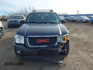 2005 GMC Envoy SLT z VIN 1GKET16M156142931, wystawiony jako IAAI lot #41584914 z przebiegiem 215 452 mil mil oraz . Historia ofert i sprzedaży dostępna na DreamBid. Obrazek 12.