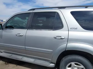 2002 Toyota Sequoia SR5 with VIN 5TDZT34A32S113234, listed as a IAAI auction lot 42086627 with 282,821 mi miles and . Bid and sale history available at carsss.com. Image 14.
