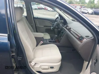 2009 Ford Taurus SEL with VIN 1FAHP24W89G106621, listed as a IAAI auction lot 42209803 with 60,373 mi miles. Bid and sale history available at carsss.com. Image 5.