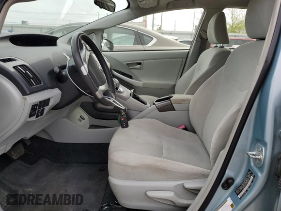2013 Toyota Prius One z VIN JTDKN3DU2D1669993, wystawiony jako Copart lot #58293375 z przebiegiem 96 515 mil mil oraz Czysty tytuł • Clean title. Historia ofert i sprzedaży dostępna na DreamBid. Obrazek 7.