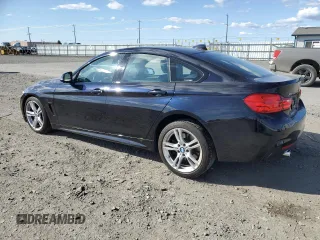 2015 BMW 4 Series 435i xDrive with VIN WBA4B3C51FGV48817, listed as a Copart auction lot 52997265 with 77,812 mi miles and Salvage Title. Bid and sale history available at DreamBid. Image 2.