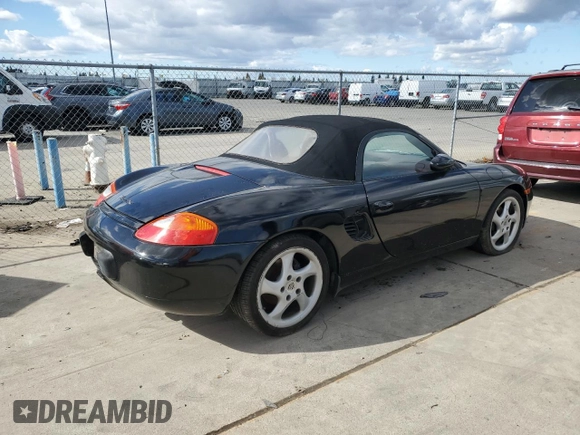 2000 Porsche Boxster z VIN WP0CA2988YU627807, wystawiony jako Copart lot #45522955 z przebiegiem 120 384 mil mil oraz Szkody całkowita. Historia ofert i sprzedaży dostępna na DreamBid. Obrazek 3.