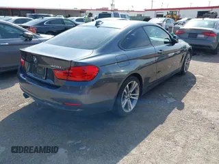 2015 BMW 4 Series 428i xDrive z VIN WBA3N5C55FK484938, wystawiony jako IAAI lot #41889907 z przebiegiem 100 439 mil mil oraz . Historia ofert i sprzedaży dostępna na DreamBid. Obrazek 4.