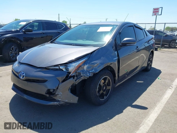 2016 Toyota Prius Two z VIN JTDKBRFU1G3521884, wystawiony jako IAAI lot #42081852 z przebiegiem 93 107 mil mil oraz . Historia ofert i sprzedaży dostępna na DreamBid. Obrazek 2.