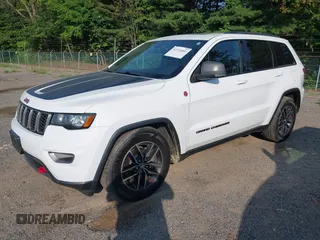 2017 Jeep Grand Cherokee Trailhawk with VIN 1C4RJFLG2HC670868, listed as a IAAI auction lot 42711041 with 129,465 mi miles and . Bid and sale history available at DreamBid. Image 2.