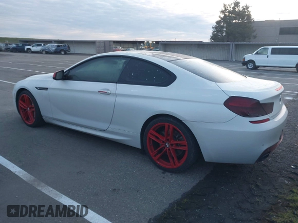 2013 BMW 6 Series 650i with VIN WBAYM9C57DDW20312, listed as a IAAI auction lot 41861212 with 98,662 mi miles and . Bid and sale history available at carsss.com. Image 14.