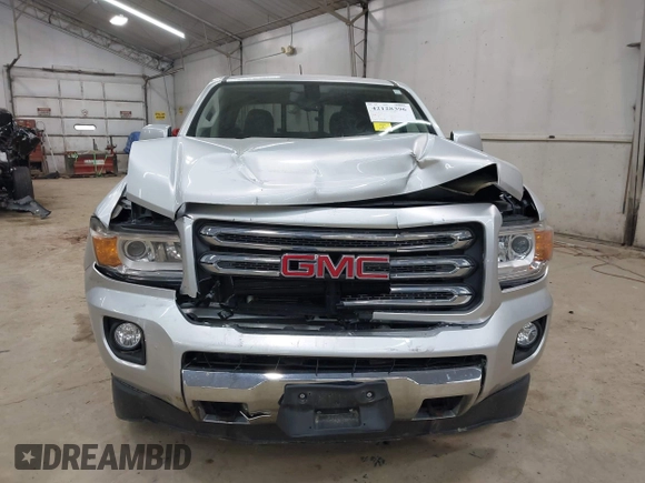 2015 GMC Canyon 4WD SLE z VIN 1GTG6BE39F1252926, wystawiony jako IAAI lot #42128396 z przebiegiem 113 139 mil mil oraz . Historia ofert i sprzedaży dostępna na DreamBid. Obrazek 12.