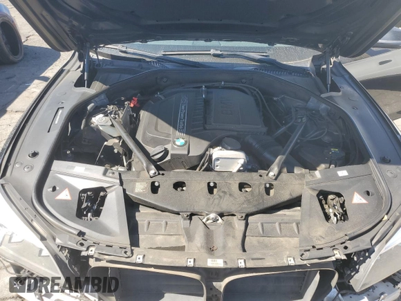 2015 BMW 7 Series 740Li with VIN WBAYE4C59FD947328, listed as a Copart auction lot 68987863 with 117,312 mi miles and . Bid and sale history available at DreamBid. Image 11.