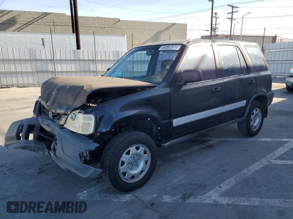 2000 Honda CR-V LX with VIN JHLRD2848YC006656, listed as a Copart auction lot 84562074 with 230,352 mi miles and Salvage Title. Bid and sale history available at carsss.com. Image 1.