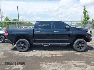 2014 Toyota Tundra Platinum with VIN 5TFAW5F15EX354983, listed as a IAAI auction lot 42392023 with 225,580 mi miles and . Bid and sale history available at DreamBid. Image 14.