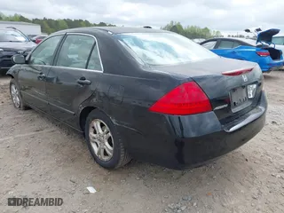 2006 Honda Accord Sdn LX SE with VIN 1HGCM56306A042513, listed as a IAAI auction lot 41926320 with 214,684 mi miles. Bid and sale history available at carsss.com. Image 3.