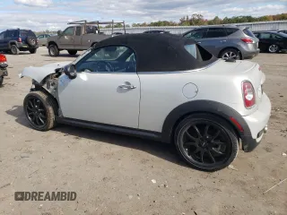 2012 MINI Roadster S z VIN WMWSY3C57CT144767, wystawiony jako Copart lot #76274884 z przebiegiem 44 896 mil mil oraz Tytuł czysty. Historia ofert i sprzedaży dostępna na DreamBid. Obrazek 2.