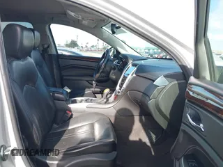 2014 Cadillac SRX Performance Collection with VIN 3GYFNCE39ES544135, listed as a IAAI auction lot 41808644 with 145,772 mi miles and . Bid and sale history available at carsss.com. Image 5.