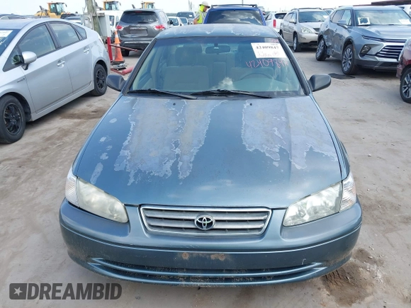 2001 Toyota Camry CE z VIN JT2BG22K310536515, wystawiony jako IAAI lot #42409847 z przebiegiem 205 978 mil mil oraz . Historia ofert i sprzedaży dostępna na DreamBid. Obrazek 6.