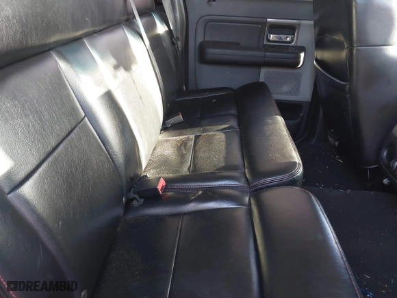 2007 Ford F-150 XLT with VIN 1FTPW12V77KA56155, listed as a IAAI auction lot 41269875 with 218,645 mi miles. Bid and sale history available at carsss.com. Image 8.