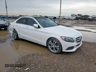 2016 Mercedes-Benz C 300 with VIN 55SWF4JB1GU154078, listed as a Copart auction lot 60606455 with 99,455 mi miles and Salvage title. Bid and sale history available at DreamBid. Image 4.