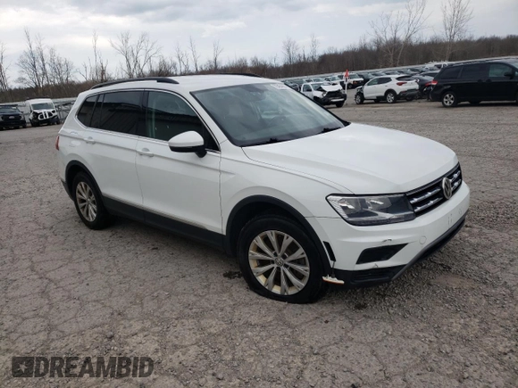 2018 Volkswagen Tiguan SEL with VIN 3VV2B7AX9JM065985, listed as a Copart auction lot 79404694 with Not provided miles and Salvage title. Bid and sale history available at DreamBid. Image 4.