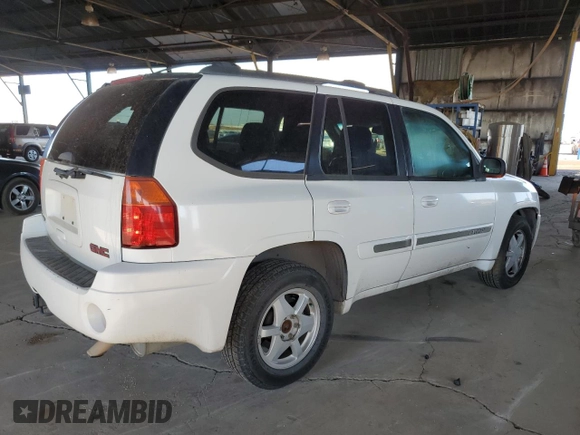 2002 GMC Envoy SLT with VIN 1GKDT13S922128924, listed as a Copart auction lot 46131035 with 162,499 mi miles and Salvage Title. Bid and sale history available at carsss.com. Image 3.