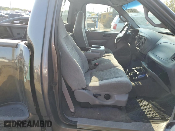 2002 Ford F-150 XL с VIN 1FTRF07202KA56864, выставлен на аукционе Copart как лот 71640724 с пробегом 165 654 миль миль и Списание • Salvage title. История ставок и продаж доступна на DreamBid. Изображение 10.
