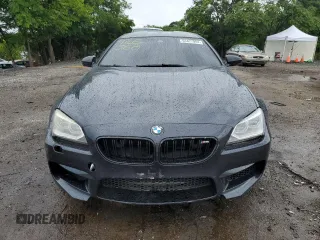 2015 BMW M6 z VIN WBS6C9C59FD467943, wystawiony jako Copart lot #63477904 z przebiegiem 80 186 mil mil oraz Szkody całkowita. Historia ofert i sprzedaży dostępna na DreamBid. Obrazek 5.