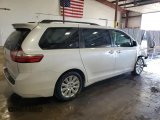 2015 Toyota Sienna XLE with VIN 5TDYK3DC4FS688299, listed as a Copart auction lot 61793155 with 57,197 mi miles and Salvage title. Bid and sale history available at DreamBid. Image 3.