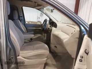2003 Ford Windstar SE with VIN 2FMZA52413BB09700, listed as a IAAI auction lot 41037056 with 179,486 mi miles and . Bid and sale history available at DreamBid. Image 5.