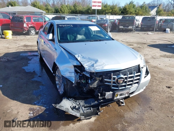 2013 Cadillac CTS Premium with VIN 1G6DP5E39D0100975, listed as a IAAI auction lot 41915113 with 110,436 mi miles and . Bid and sale history available at DreamBid. Image 1.