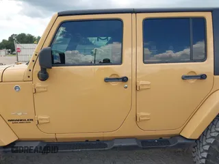 2013 Jeep Wrangler Unlimited Sahara with VIN 1C4BJWEG8DL638404, listed as a IAAI auction lot 42586604 with 43,953 mi miles and . Bid and sale history available at DreamBid. Image 14.