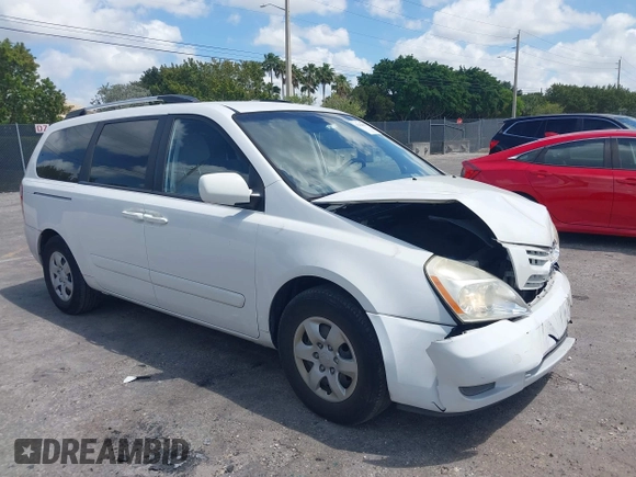 2010 Kia Sedona LX with VIN KNDMG4C33A6338047, listed as a IAAI auction lot 42128485 with 99,498 mi miles and . Bid and sale history available at carsss.com. Image 1.