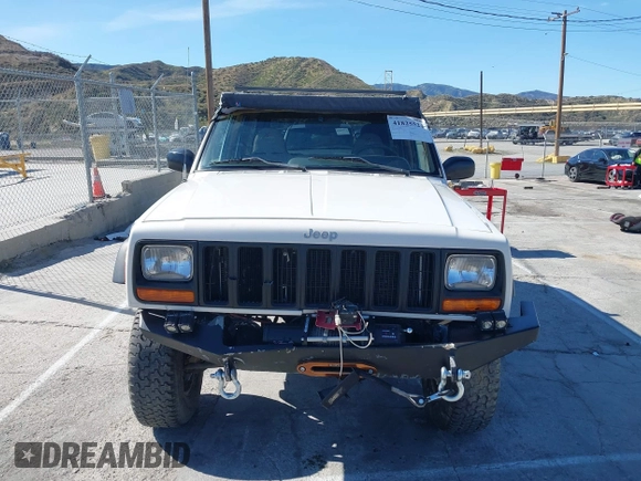 1997 Jeep Cherokee SE with VIN 1J4FJ28S7VL553270, listed as a IAAI auction lot 41825524 with 157,015 mi miles. Bid and sale history available at carsss.com. Image 12.