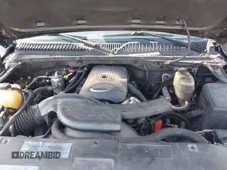 2004 Chevrolet Suburban LT z VIN 1GNFK16Z94J122458, wystawiony jako IAAI lot #41889018 z przebiegiem 180 507 mil mil oraz . Historia ofert i sprzedaży dostępna na DreamBid. Obrazek 10.