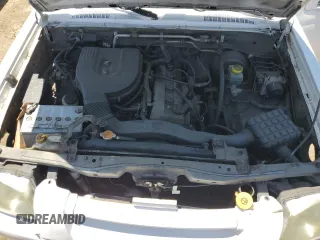 2003 Nissan Frontier XE with VIN 1N6DD26T73C425850, listed as a Copart auction lot 63330345 with 246,140 mi miles and Salvage title. Bid and sale history available at DreamBid. Image 11.