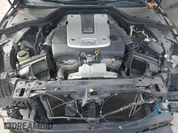 2015 Infiniti Q50 Premium z VIN JN1BV7ARXFM418246, wystawiony jako Copart lot #44890175 z przebiegiem 144 269 mil mil oraz Szkody całkowita. Historia ofert i sprzedaży dostępna na DreamBid. Obrazek 11.
