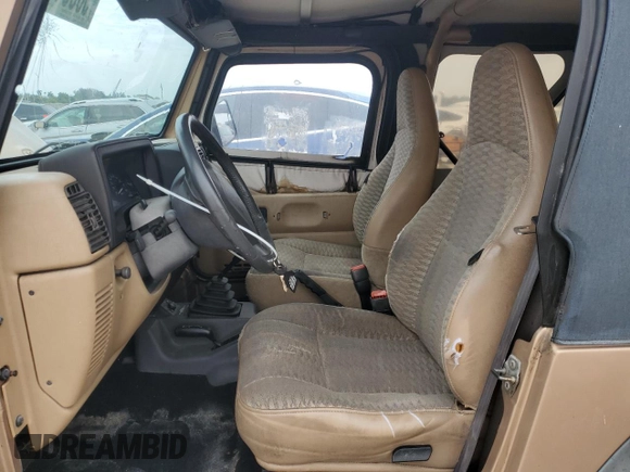 1999 Jeep Wrangler SE with VIN 1J4FY29P2XP451036, listed as a Copart auction lot 50551755 with 0 mi miles and Salvage Title. Bid and sale history available at carsss.com. Image 7.