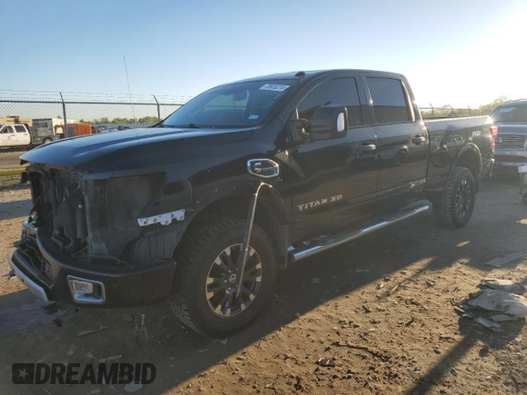 2019 Nissan Titan XD SL with VIN 1N6BA1F43KN529676, listed as a Copart auction lot 79935214 with 135,734 mi miles and Salvage Title. Bid and sale history available at carsss.com. Image 1.