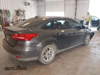 2015 Ford Focus SE with VIN 1FADP3F23FL216154, listed as a IAAI auction lot 42411857 with 127,612 mi miles and . Bid and sale history available at DreamBid. Image 4.