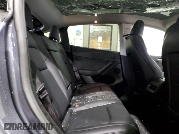 2023 Tesla Model Y Long Range z VIN 7SAYGDEE8PF814874, wystawiony jako Copart lot #56546365 z przebiegiem 20 919 mil mil oraz Szkoda całkowita • Salvage title. Historia ofert i sprzedaży dostępna na DreamBid. Obrazek 10.