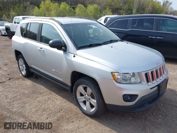 2013 Jeep Compass Sport with VIN 1C4NJDBB4DD119077, listed as a IAAI auction lot 42142532 with 131,679 mi miles. Bid and sale history available at carsss.com. Image 1.