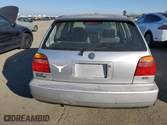 1998 Volkswagen Golf z VIN 3VWFA81H8WM251233, wystawiony jako Copart lot #42441795 z przebiegiem 122 969 mil mil oraz Czysty tytuł • Clean title. Historia ofert i sprzedaży dostępna na DreamBid. Obrazek 6.