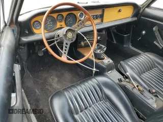 1974 FIAT 124 Spider z VIN 124CS10081683, wystawiony jako Copart lot #58650195 z przebiegiem 143 647 mil mil oraz Czysty tytuł • Clean title. Historia ofert i sprzedaży dostępna na DreamBid. Obrazek 8.
