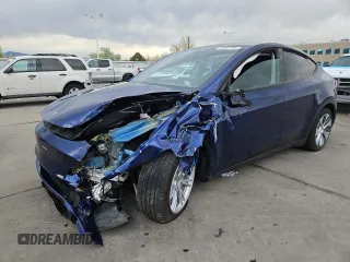 2023 Tesla Model Y Long Range z VIN 7SAYGDEE4PF890429, wystawiony jako Copart lot #53584195 z przebiegiem 10 250 mil mil oraz Szkoda całkowita • Salvage title. Historia ofert i sprzedaży dostępna na DreamBid. Obrazek 1.