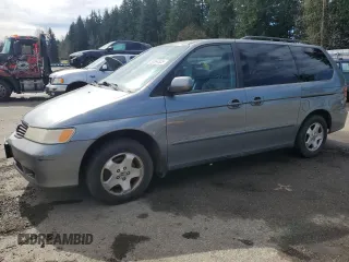 1999 Honda Odyssey EX z VIN 2HKRL1863XH009222, wystawiony jako Copart lot #50364505 z przebiegiem 160 416 mil mil oraz Czysty tytuł • Clean title. Historia ofert i sprzedaży dostępna na DreamBid. Obrazek 1.