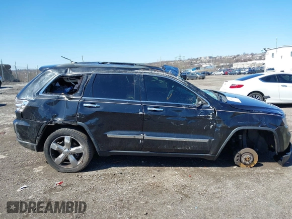 2013 Jeep Grand Cherokee Overland with VIN 1C4RJFCT2DC536899, listed as a IAAI auction lot 41853217 with 1 mi miles. Bid and sale history available at carsss.com. Image 12.