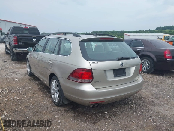2014 Volkswagen Jetta TDI w/Sunroof with VIN 3VWPL7AJ8EM606766, listed as a IAAI auction lot 42440965 with 96,404 mi miles and . Bid and sale history available at DreamBid. Image 3.